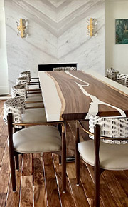 long wooden table with chairs